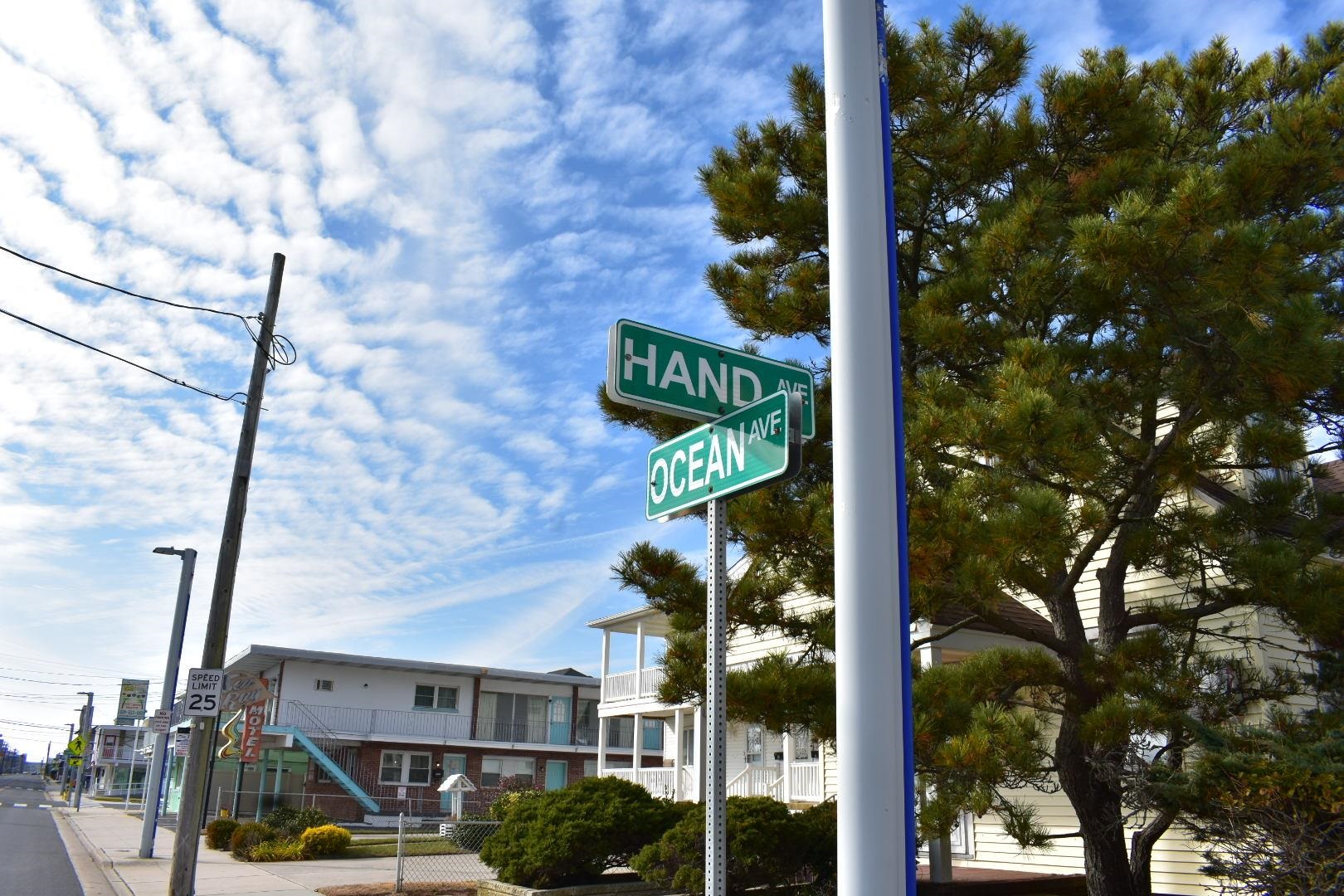 310 East Hand, Unit 4 Wildwood, NJ 08260 - Photo 12 of 17 a street sign on a pole on a street