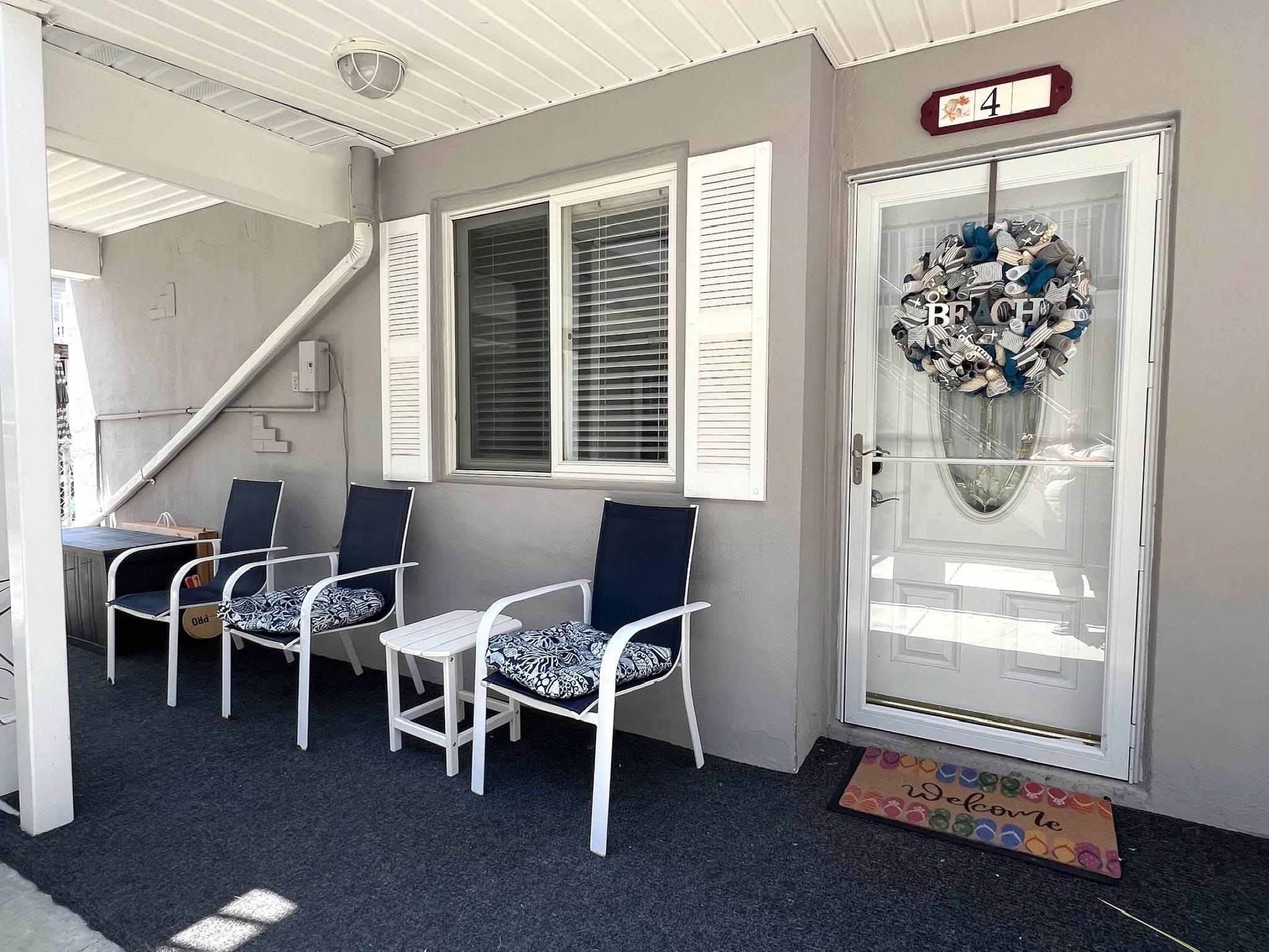 310 East Hand, Unit 4 Wildwood, NJ 08260 - Photo 2 of 17 a dining room with furniture and window