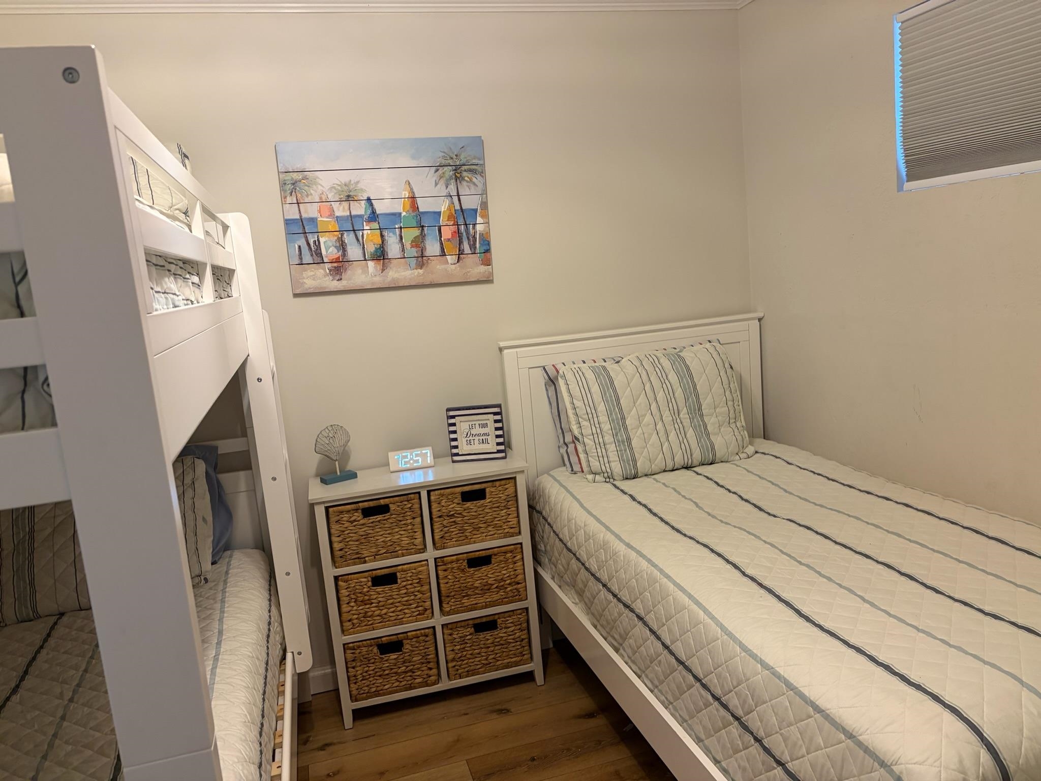 310 East Hand, Unit 4 Wildwood, NJ 08260 - Photo 10 of 17 a bedroom with a bed and a window