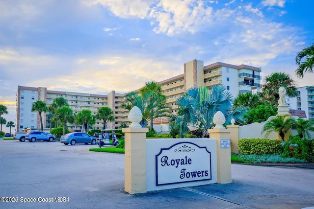 a view of street with parked cars
