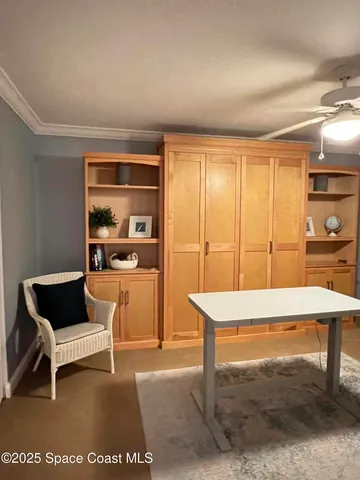 a room with table and chairs