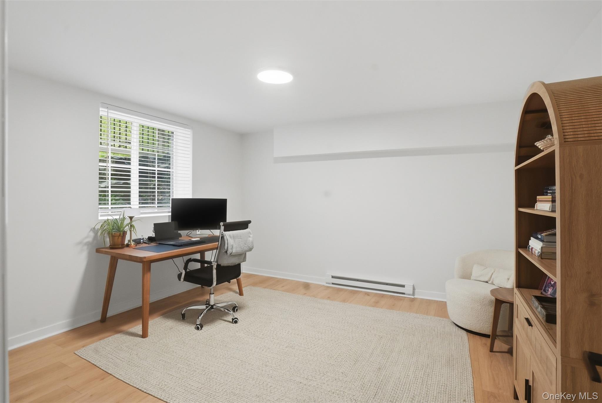 9 Schoolhouse Road Middletown, NY 10940 - Photo 28 of 36 a view of a workspace with furniture and a window