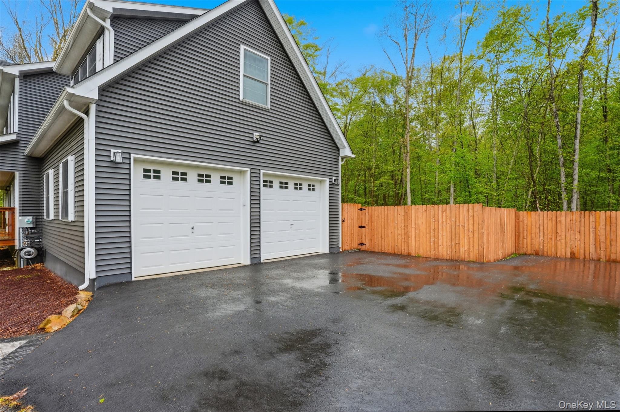 9 Schoolhouse Road Middletown, NY 10940 - Photo 30 of 36 a view of a house with a backyard and garage