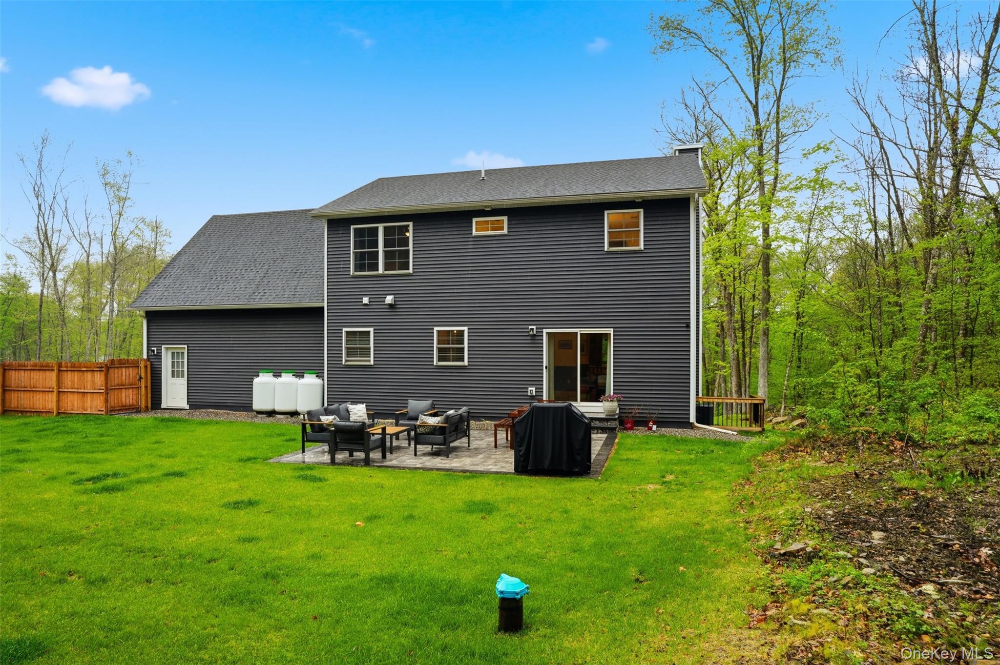 9 Schoolhouse Road Middletown, NY 10940 - Photo 35 of 36 a front view of a house with a garden