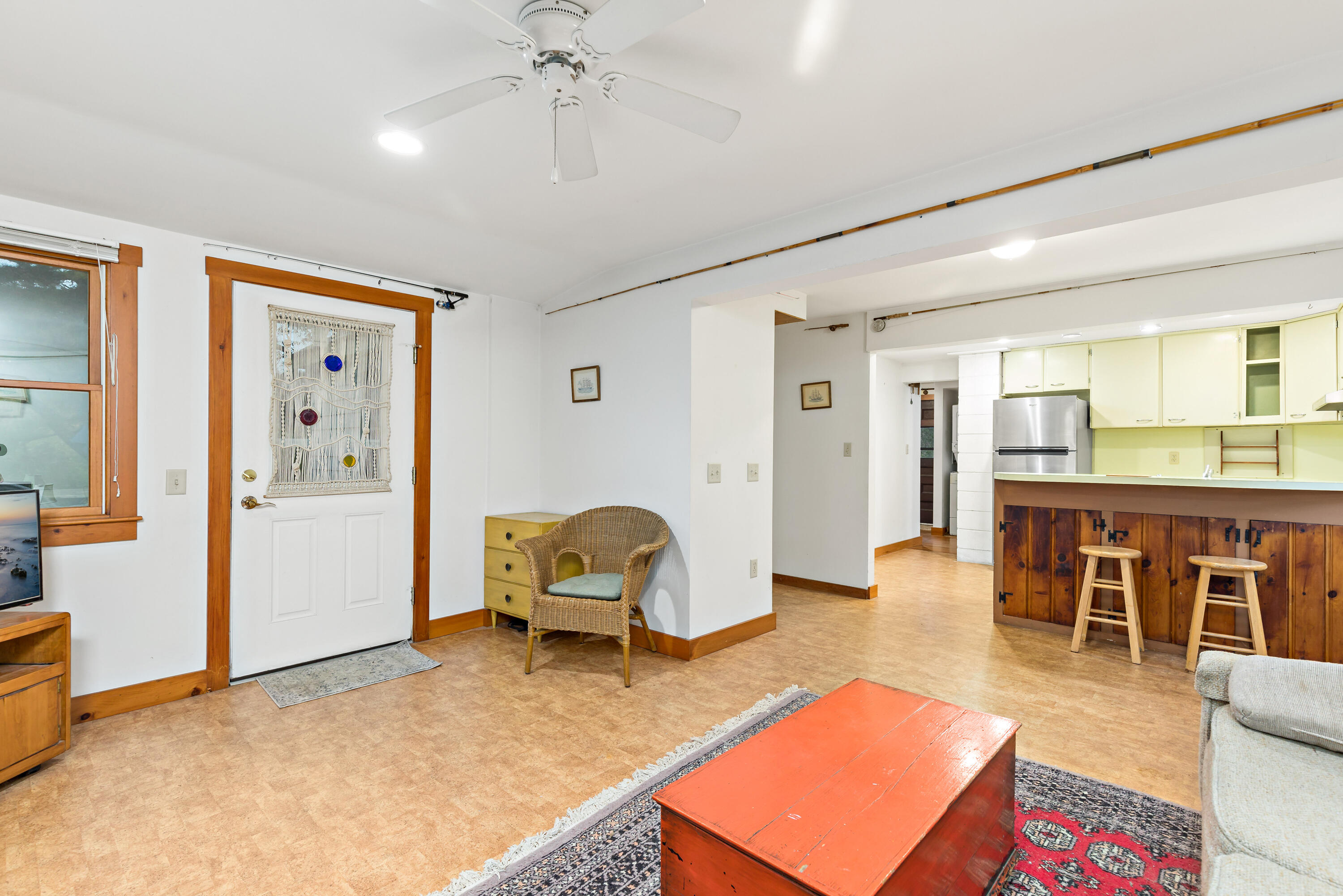 520 Samoset Road Eastham, MA 02642 - Photo 14 of 46 a living room with furniture and a dining table