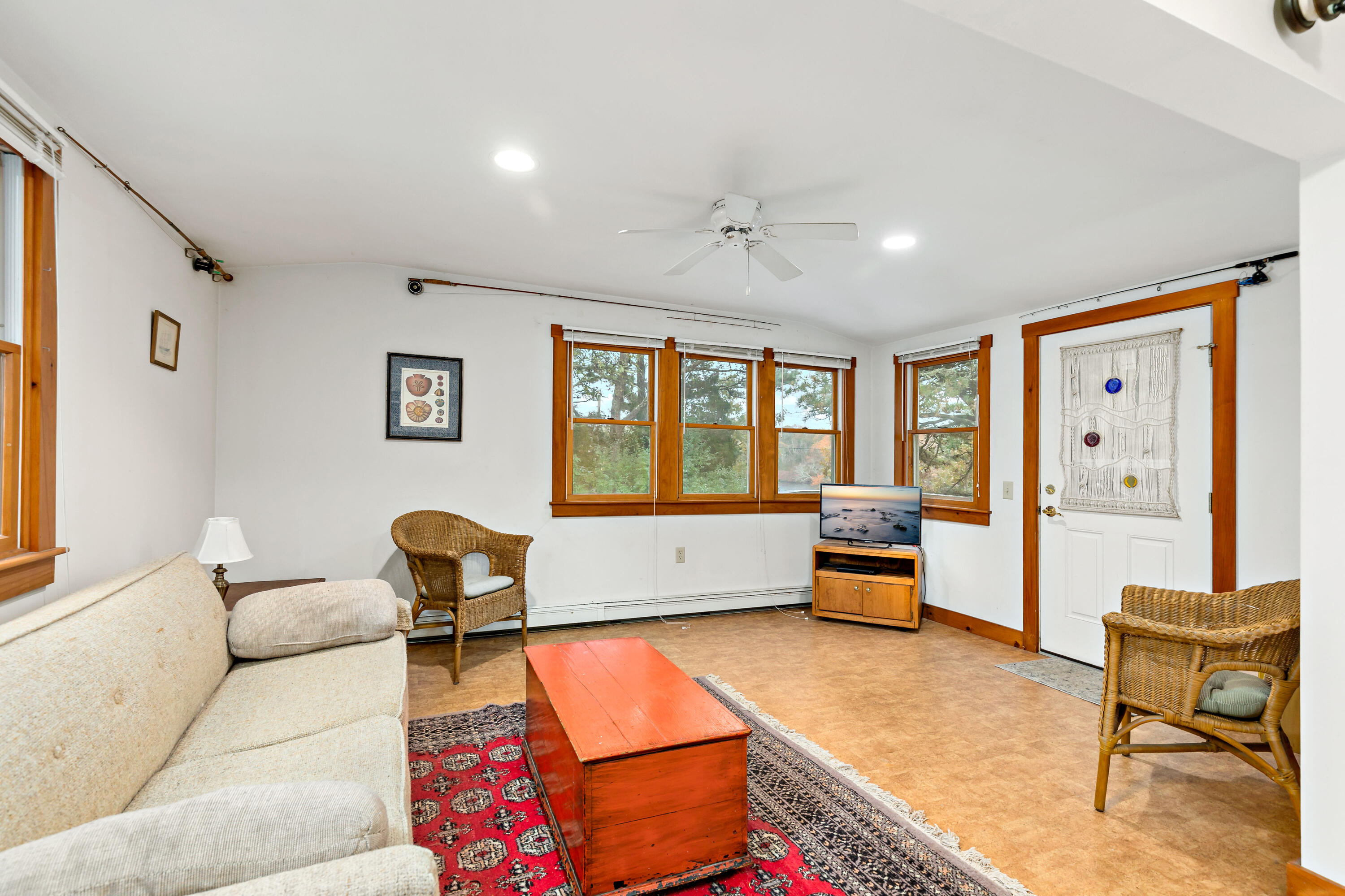 520 Samoset Road Eastham, MA 02642 - Photo 16 of 46 a living room with furniture and a window