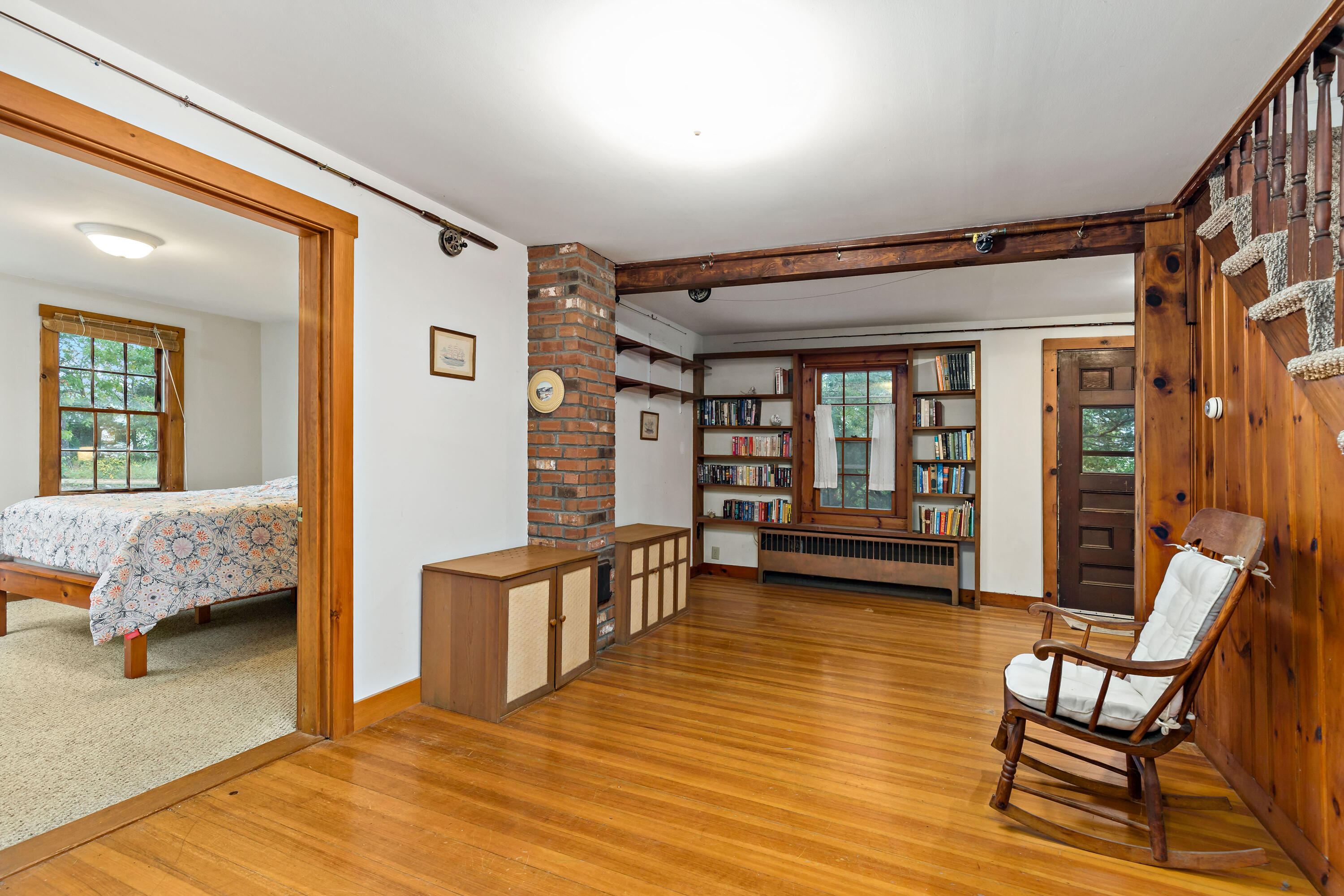 520 Samoset Road Eastham, MA 02642 - Photo 20 of 46 a living room with furniture and a wooden floor