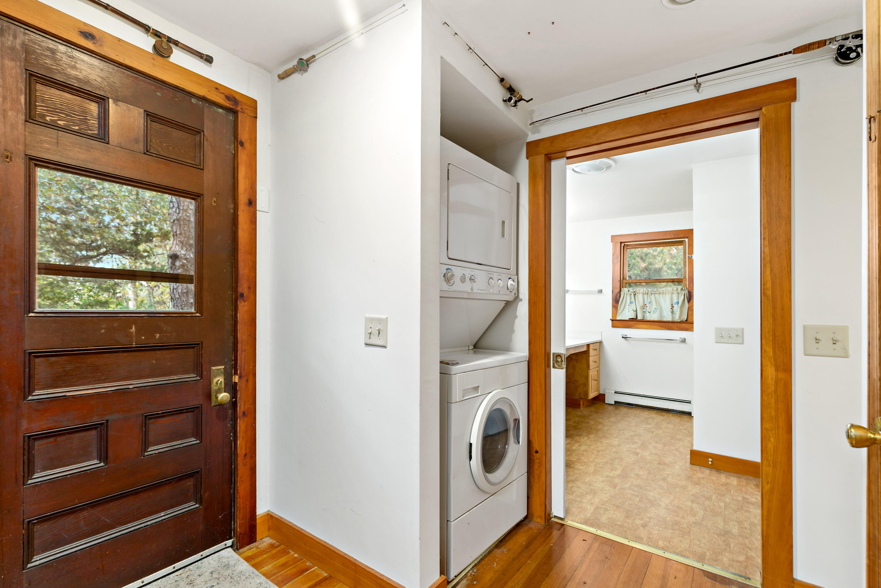 520 Samoset Road Eastham, MA 02642 - Photo 21 of 46 a view of a hallway with washer and dryer