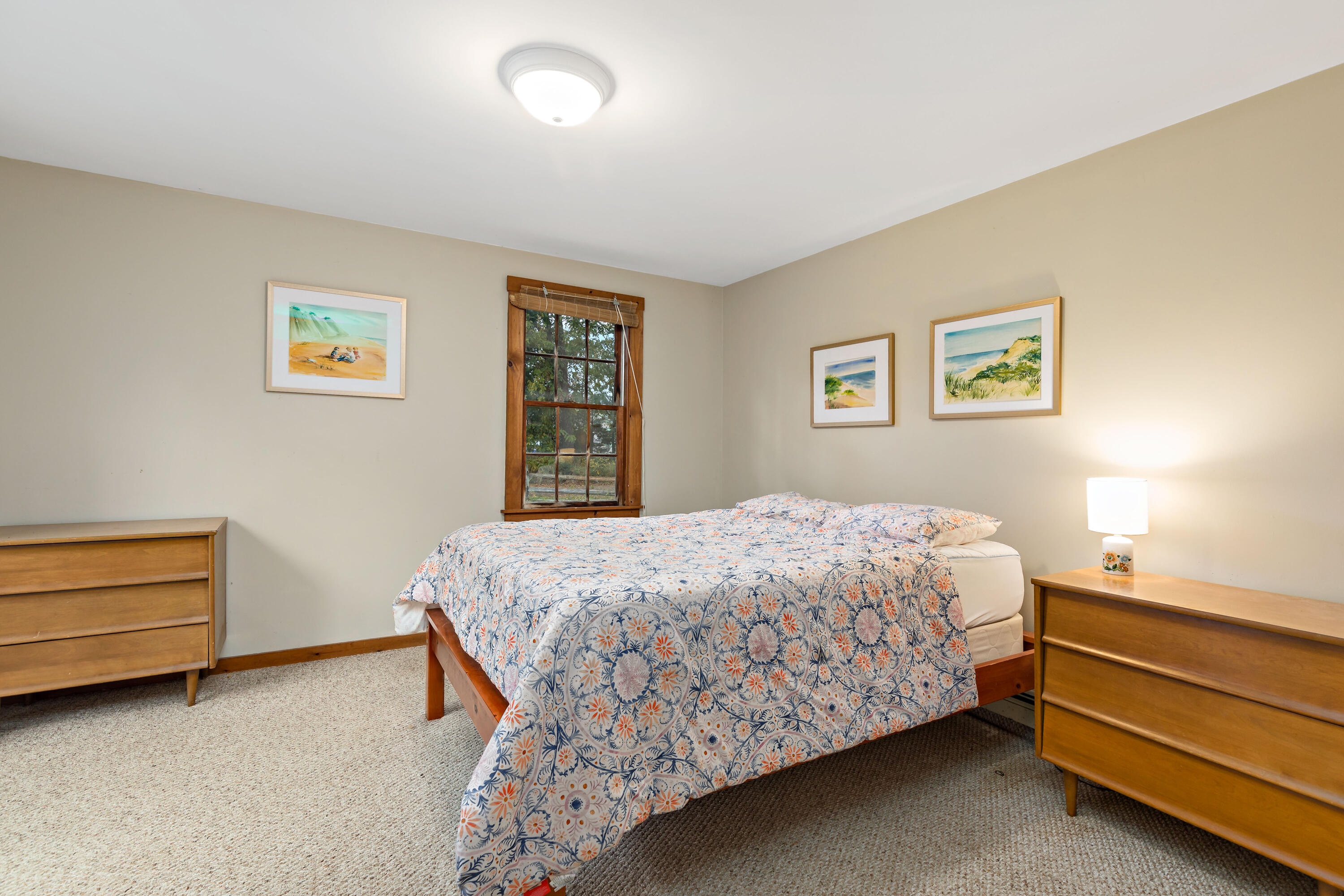 520 Samoset Road Eastham, MA 02642 - Photo 25 of 46 a bedroom with a bed and a cabinets