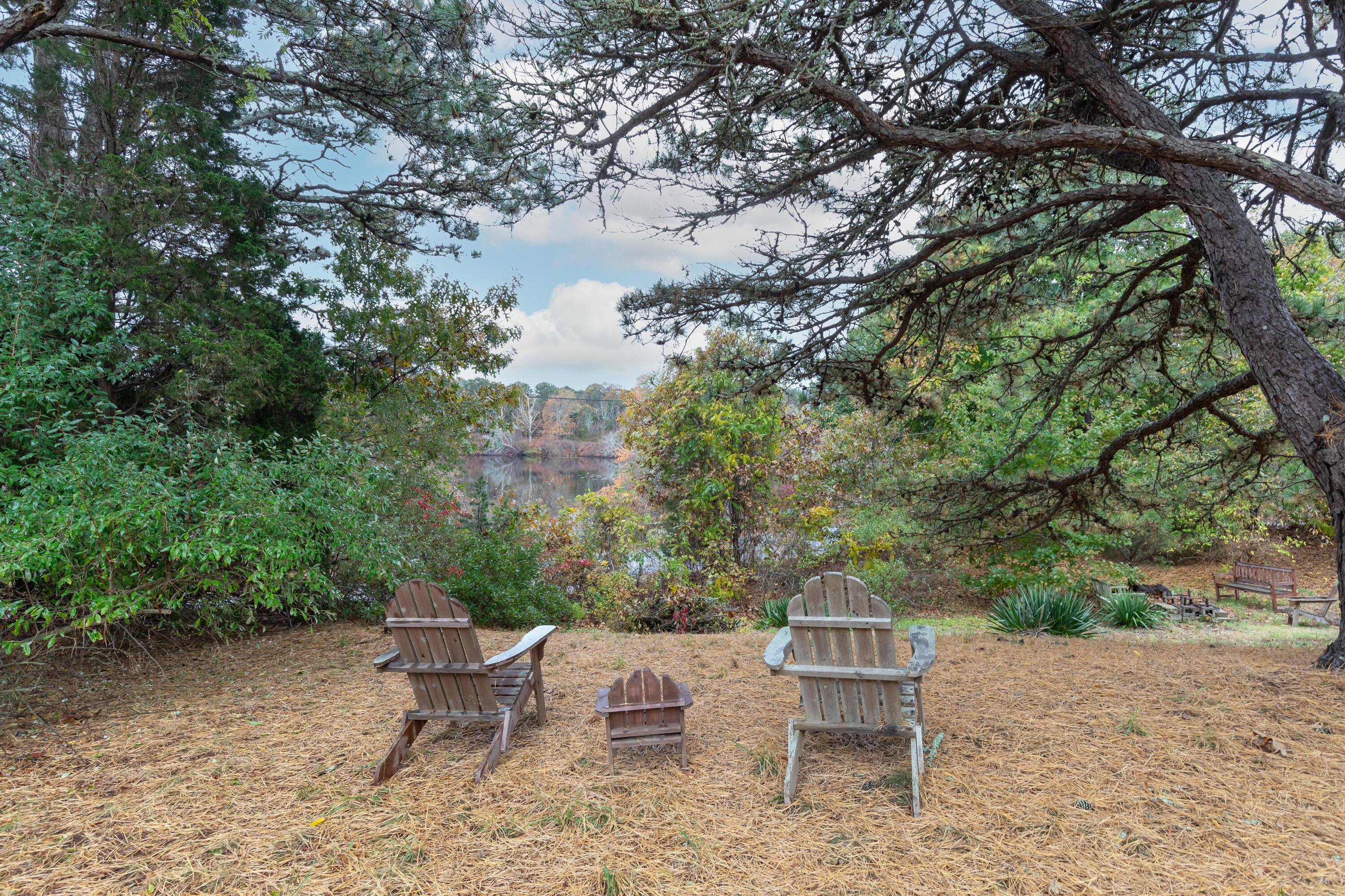 520 Samoset Road Eastham, MA 02642 - Photo 32 of 46 a view of a chairs and table in the patio