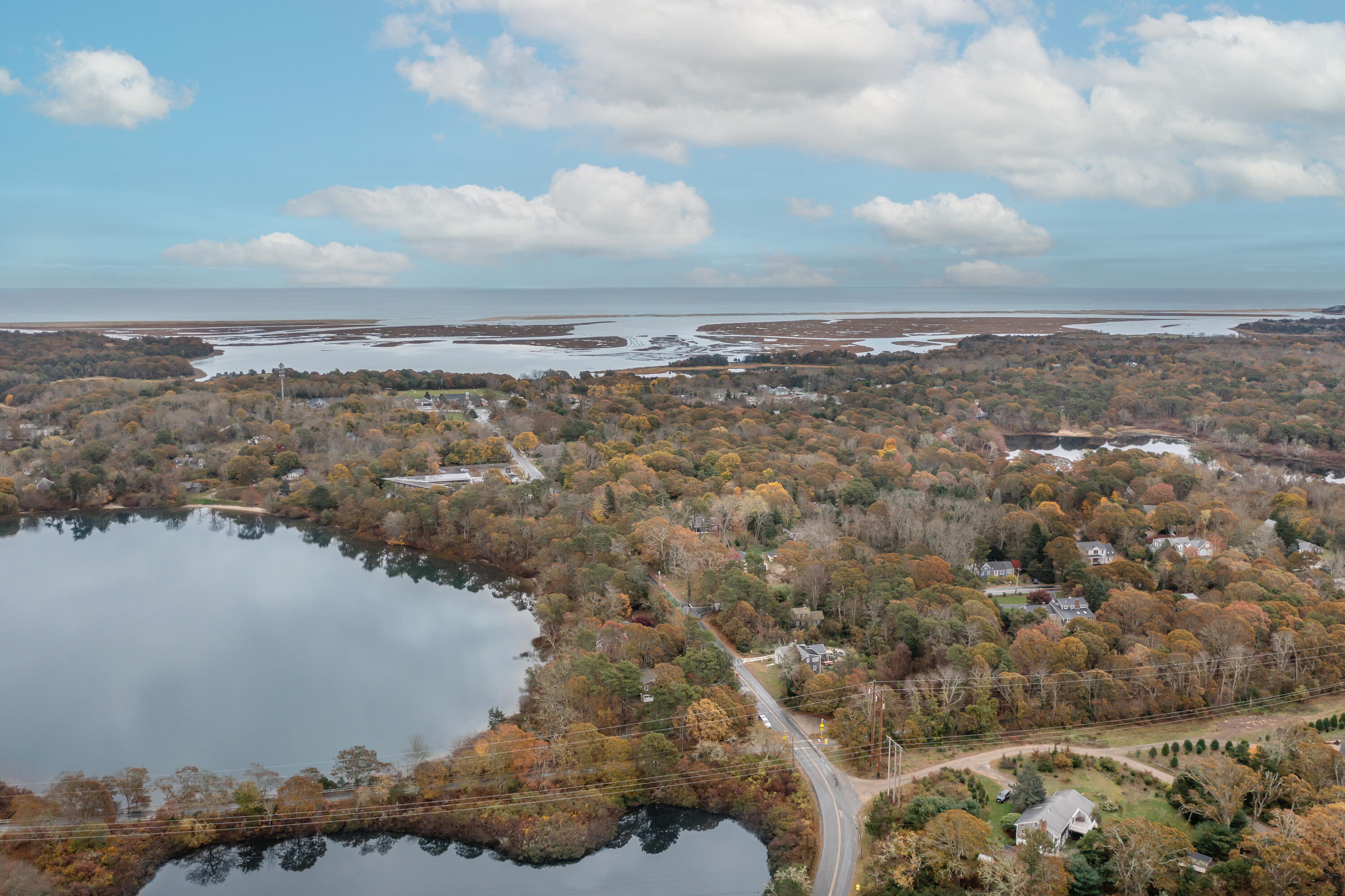 520 Samoset Road Eastham, MA 02642 - Photo 39 of 46 a view of a lake with a city