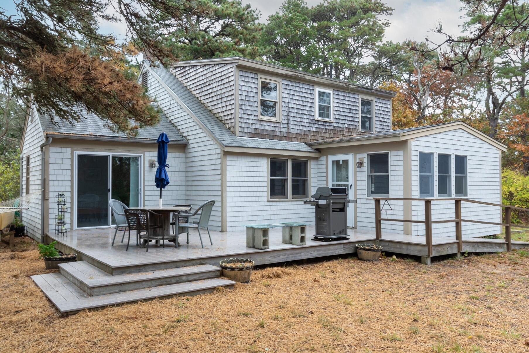 520 Samoset Road Eastham, MA 02642 - Photo 4 of 46 a view of a house with patio