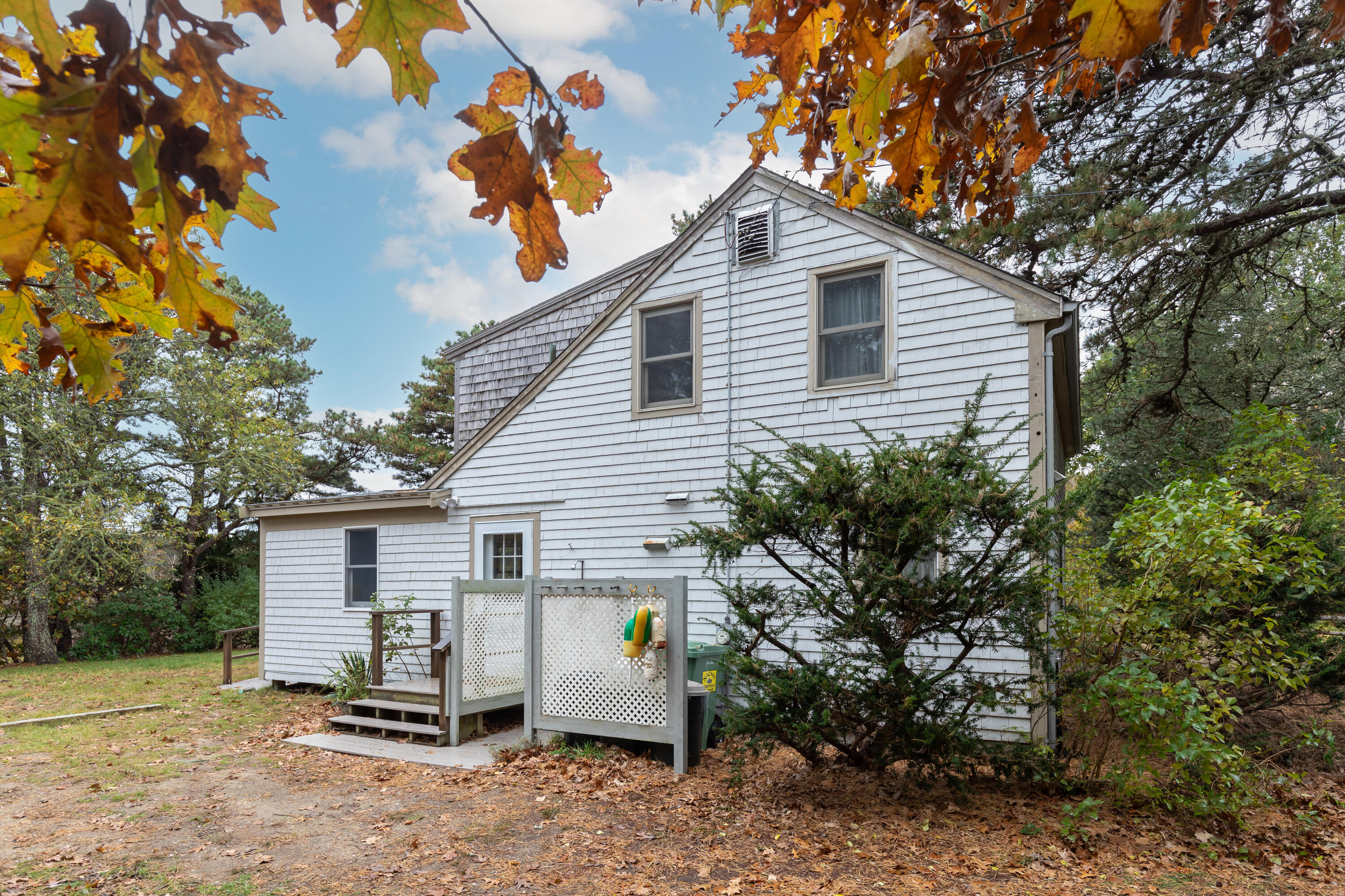 520 Samoset Road Eastham, MA 02642 - Photo 6 of 46 a view of a house with a yard