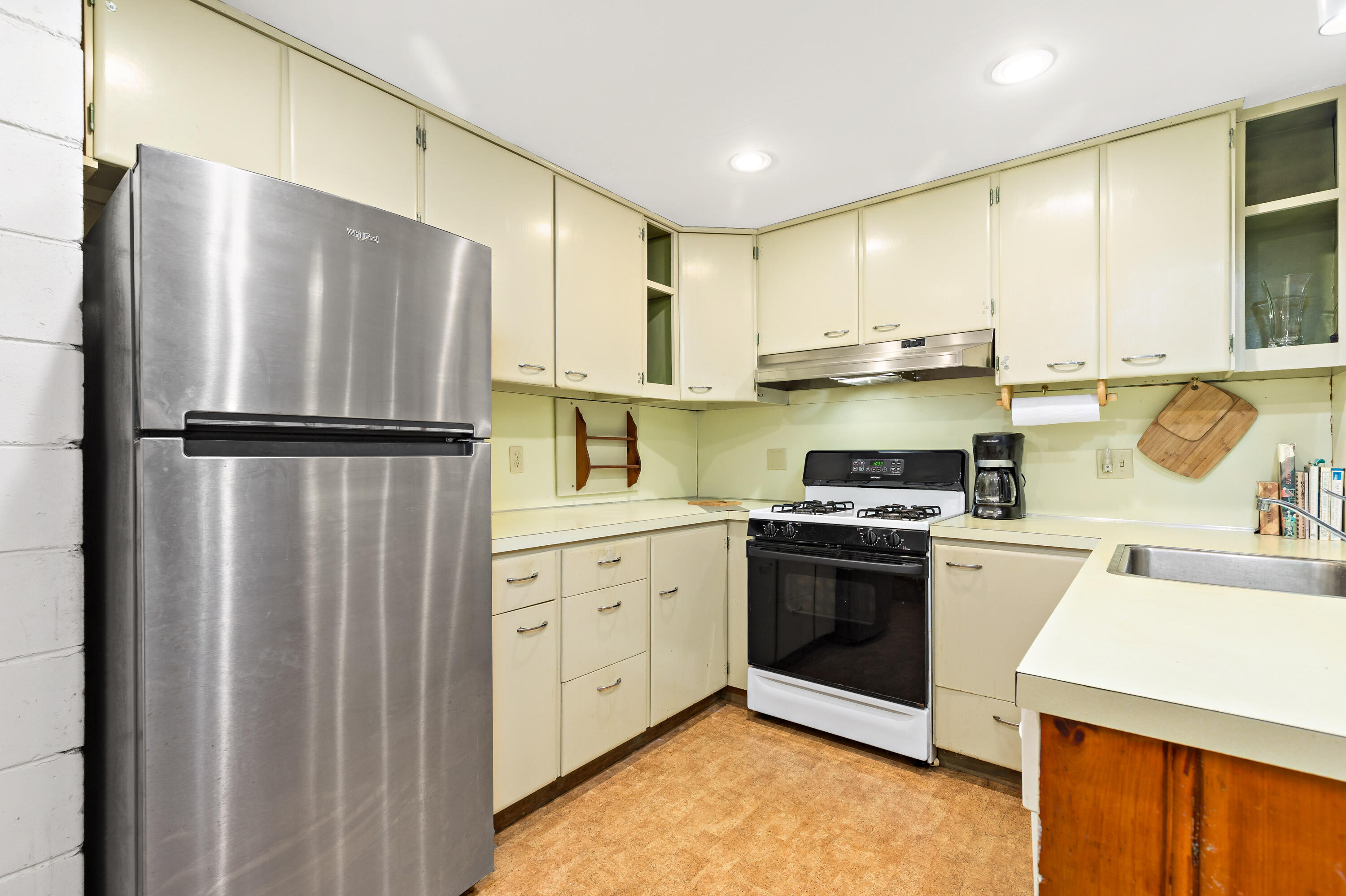 520 Samoset Road Eastham, MA 02642 - Photo 10 of 46 a kitchen with a refrigerator sink and stove