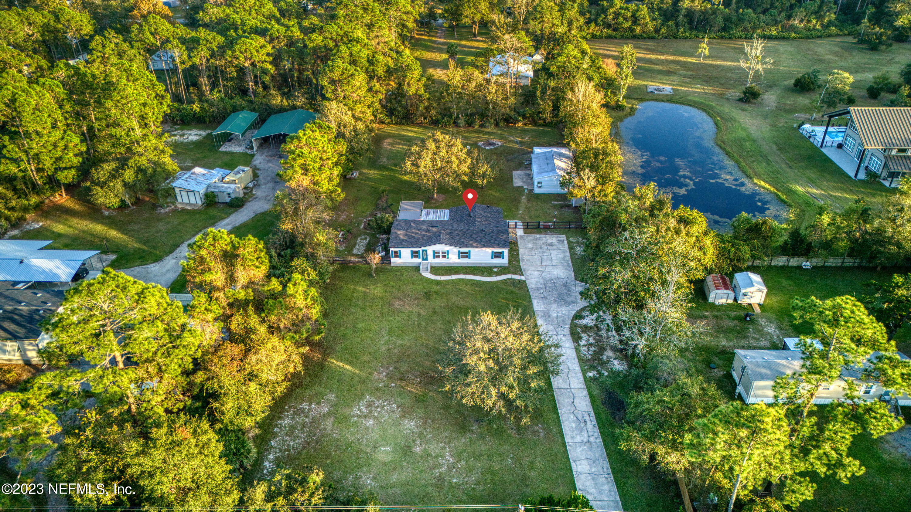 201 Stokes Landing Road St. Augustine, FL 32095 - Photo 8 of 35 a view of lake house and outdoor space