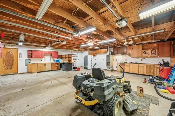 a view of parking garage with cars