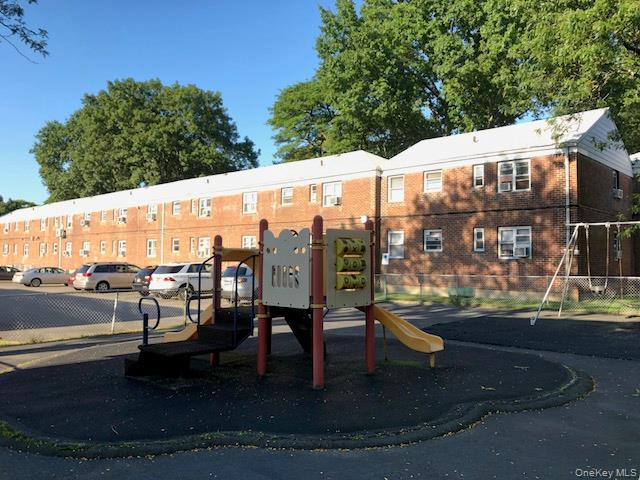 218-07 73rd Avenue, Unit UPPR Queens, NY 11364 - Photo 20 of 23 a view of outdoor space with seating area