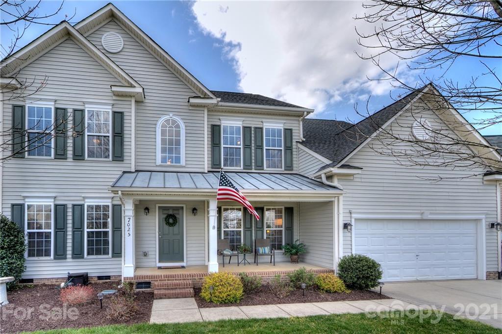 7025 Meyer Road Fort Mill, SC 29715 - Photo 2 of 41 a front view of a house with a yard and porch