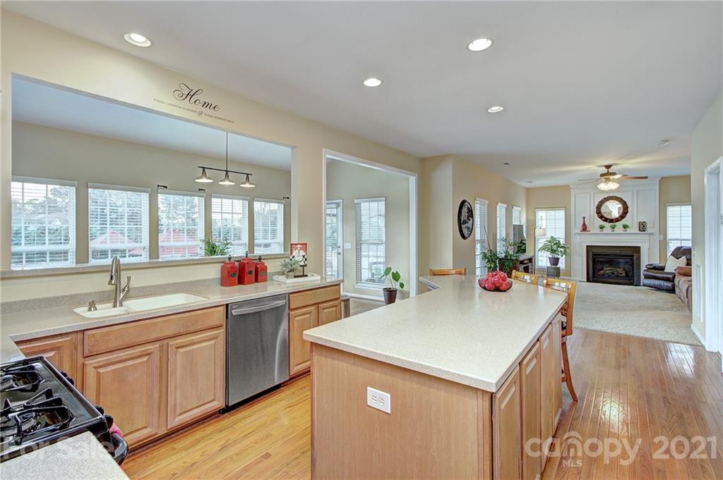 7025 Meyer Road Fort Mill, SC 29715 - Photo 12 of 41 a kitchen with a sink stove and cabinets