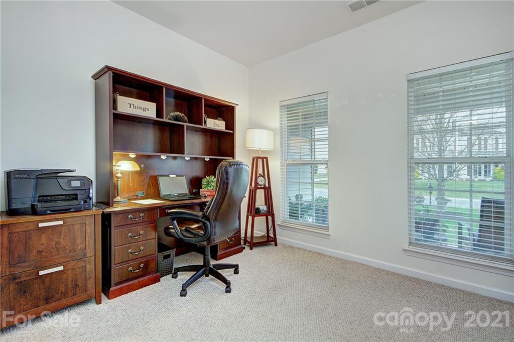 7025 Meyer Road Fort Mill, SC 29715 - Photo 16 of 41 a view of a workspace with furniture and a window