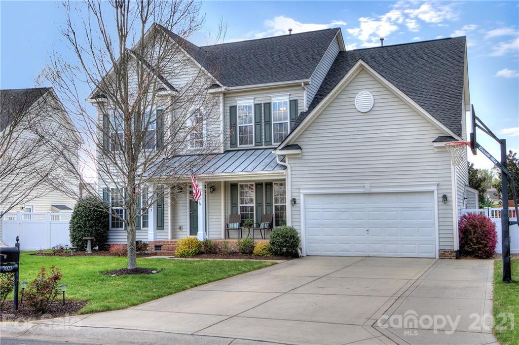 7025 Meyer Road Fort Mill, SC 29715 - Photo 3 of 41 a view of a house with a yard
