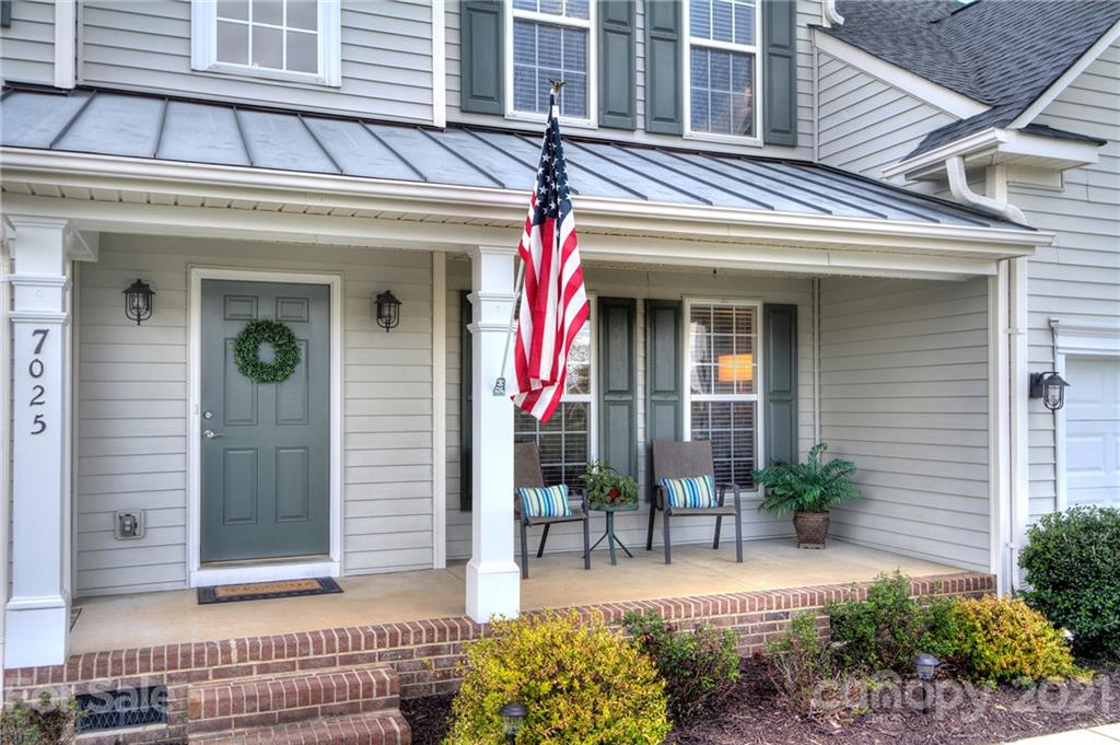 7025 Meyer Road Fort Mill, SC 29715 - Photo 4 of 41 front view of a house with a small porch