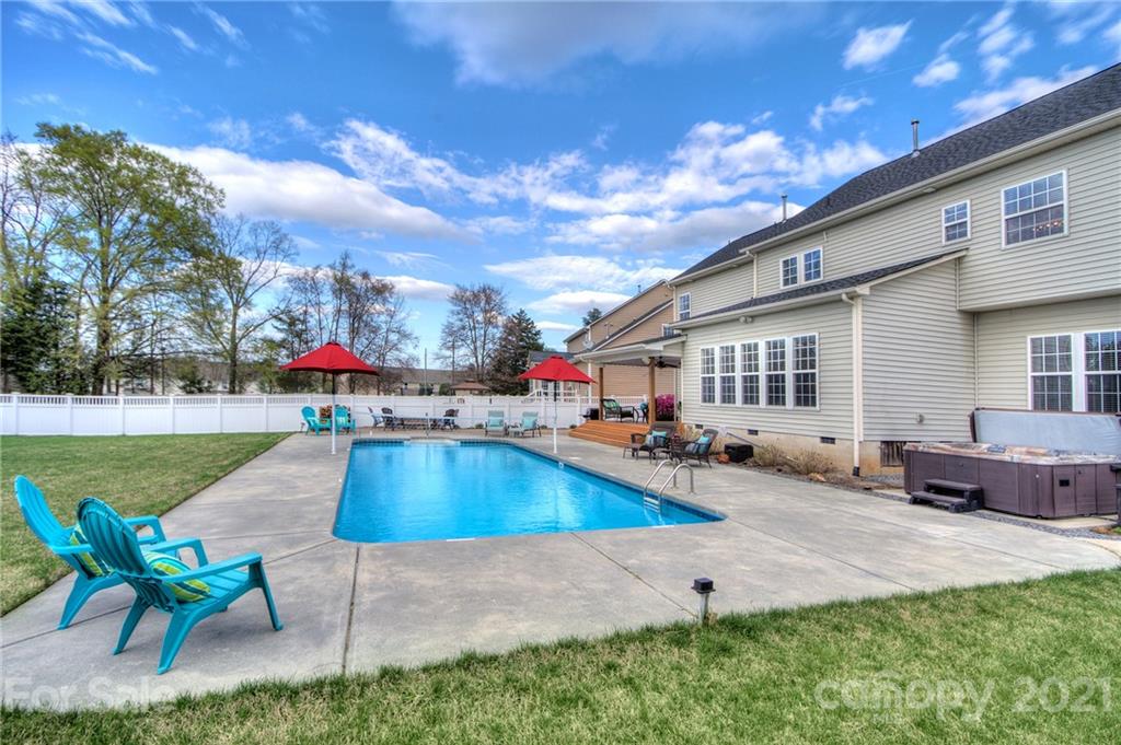 7025 Meyer Road Fort Mill, SC 29715 - Photo 32 of 41 a view of a house with swimming pool and sitting area