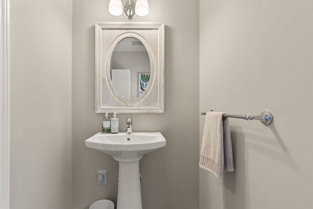 9 Bragg Road Foxboro, MA 02035 - Photo 19 of 42 a bathroom with a sink and a mirror