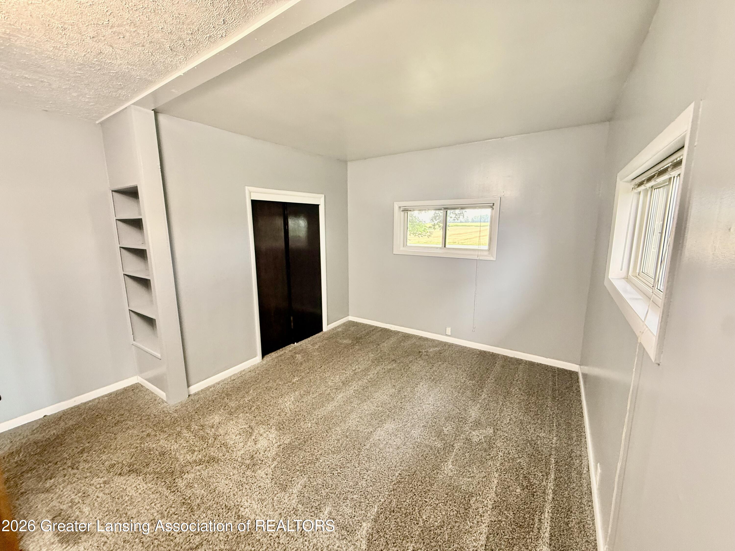 2331 West Cleveland Road Perrinton, MI 48871 - Photo 21 of 49 Master bedroom