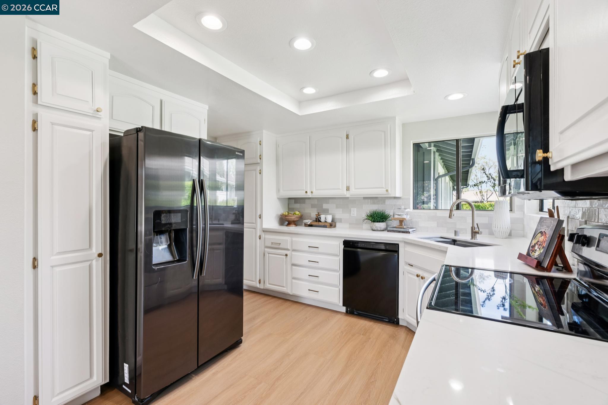 1864 St George Road Danville, CA 94526 - Photo 14 of 39 a kitchen with stainless steel appliances a refrigerator sink and stove