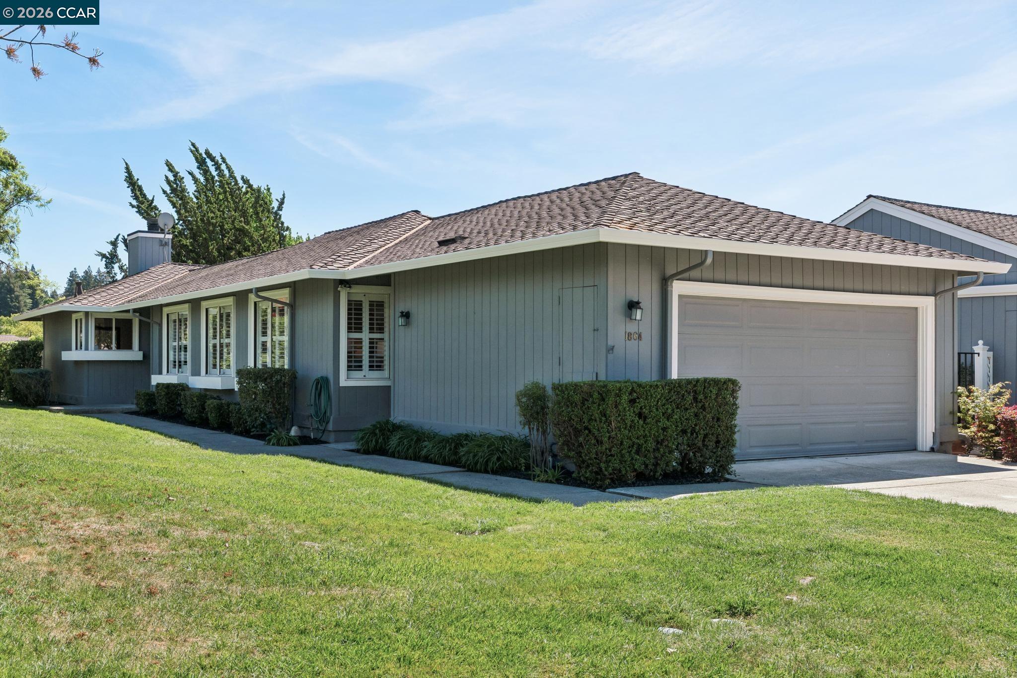 1864 St George Road Danville, CA 94526 - Photo 2 of 39 a front view of a house with a garden