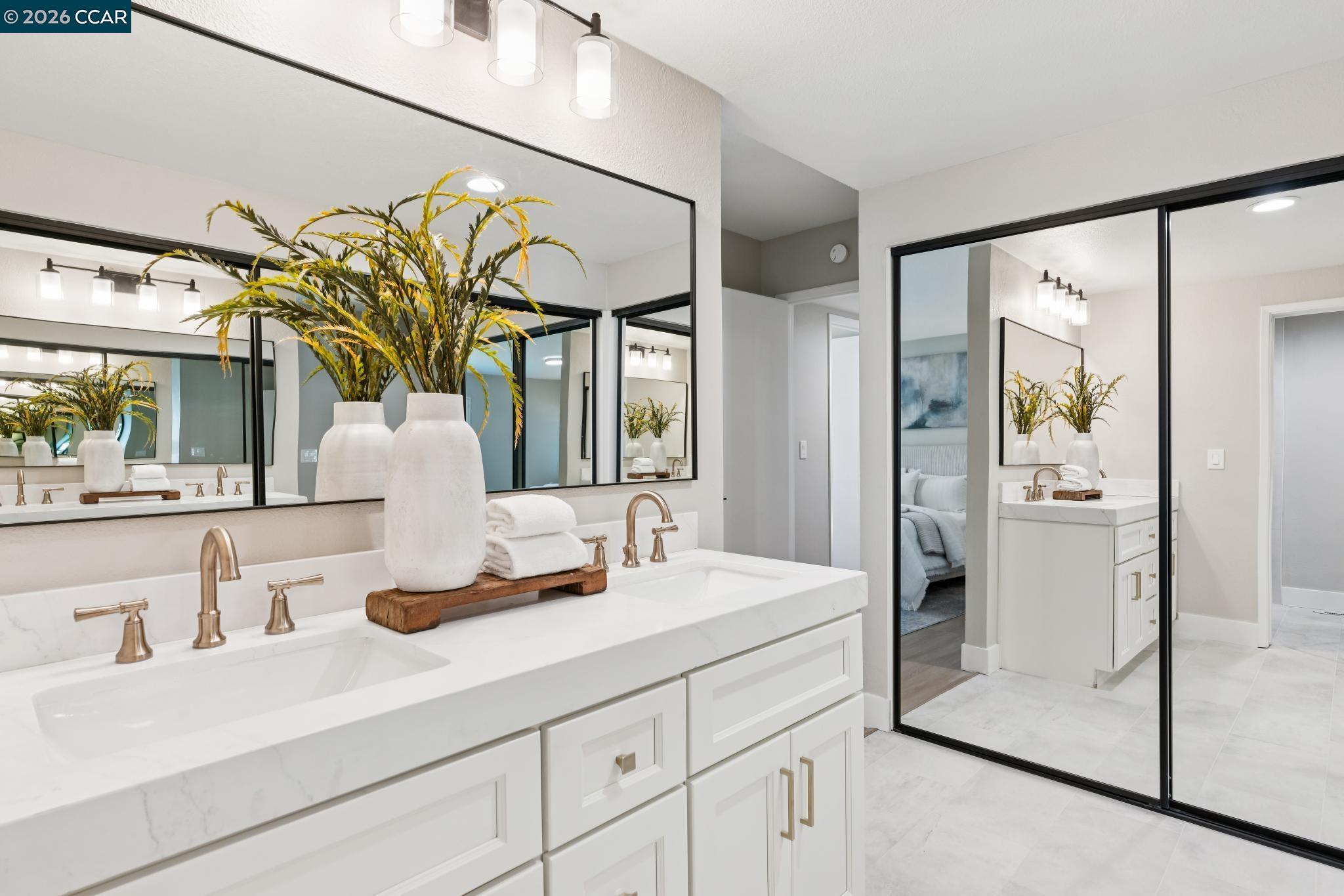 1864 St George Road Danville, CA 94526 - Photo 23 of 39 a bathroom with a sink and a mirror