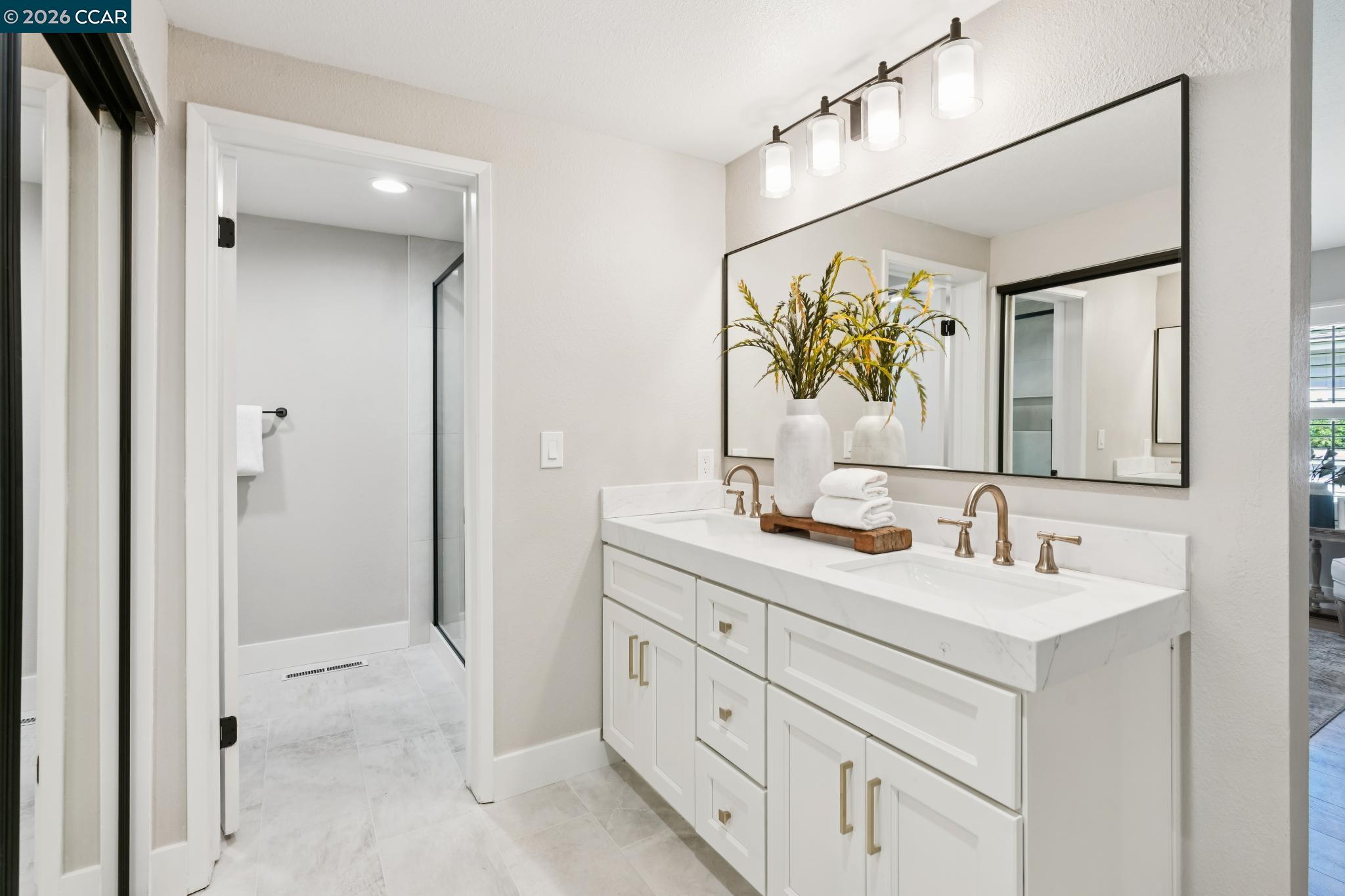 1864 St George Road Danville, CA 94526 - Photo 24 of 39 a bathroom with a double vanity sink mirror and