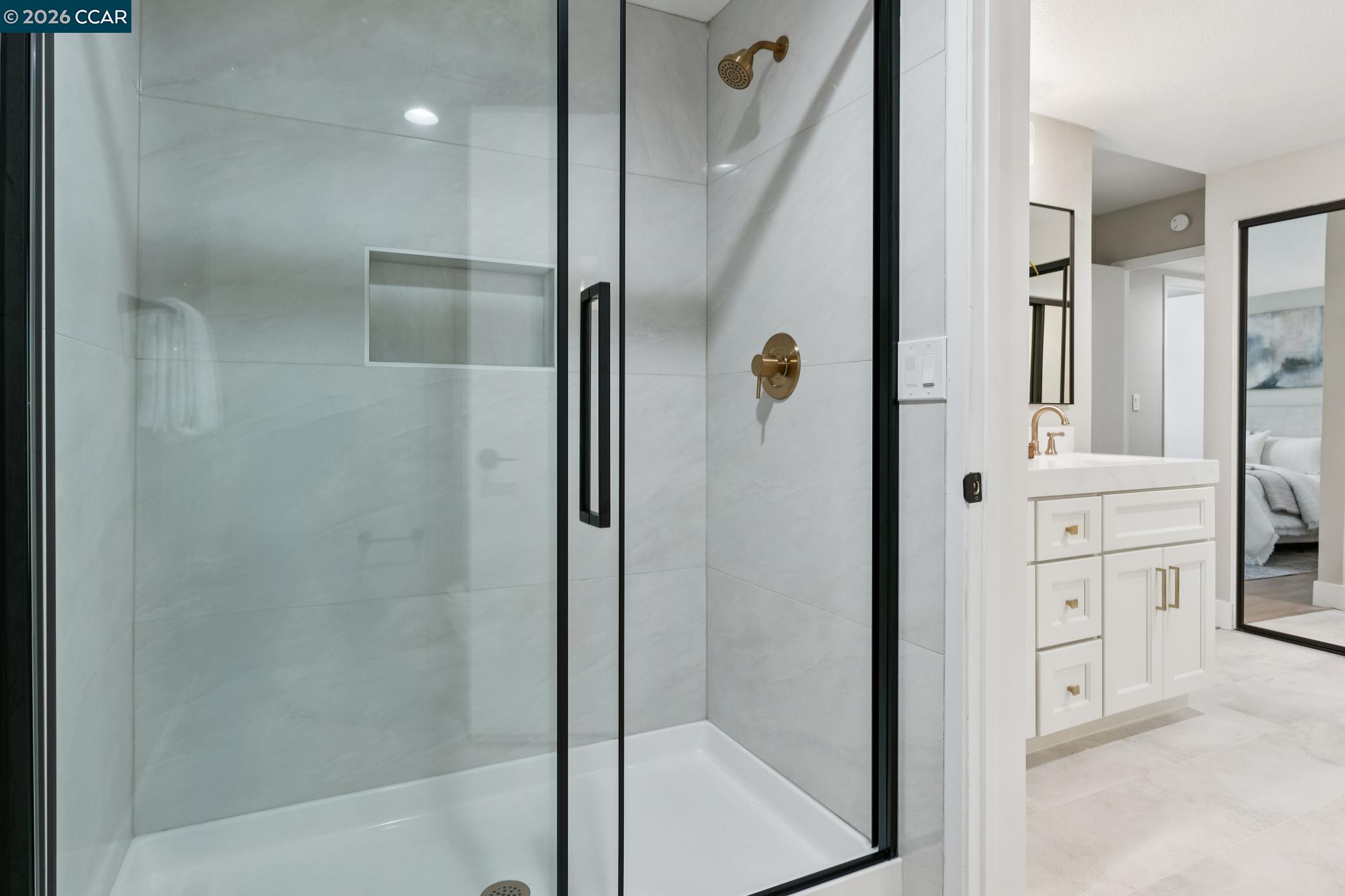 1864 St George Road Danville, CA 94526 - Photo 25 of 39 a bathroom with a shower and a glass door