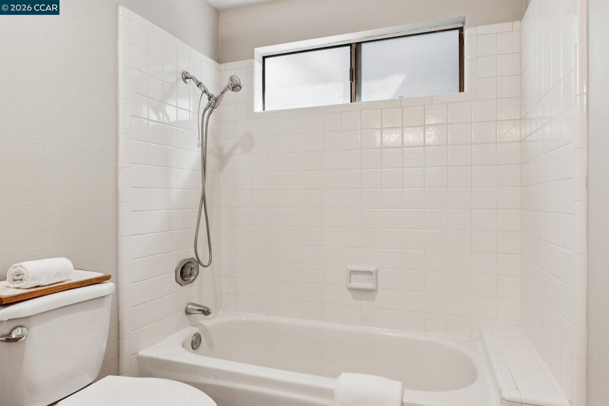 1864 St George Road Danville, CA 94526 - Photo 29 of 39 a bathroom with a bathtub and a shower