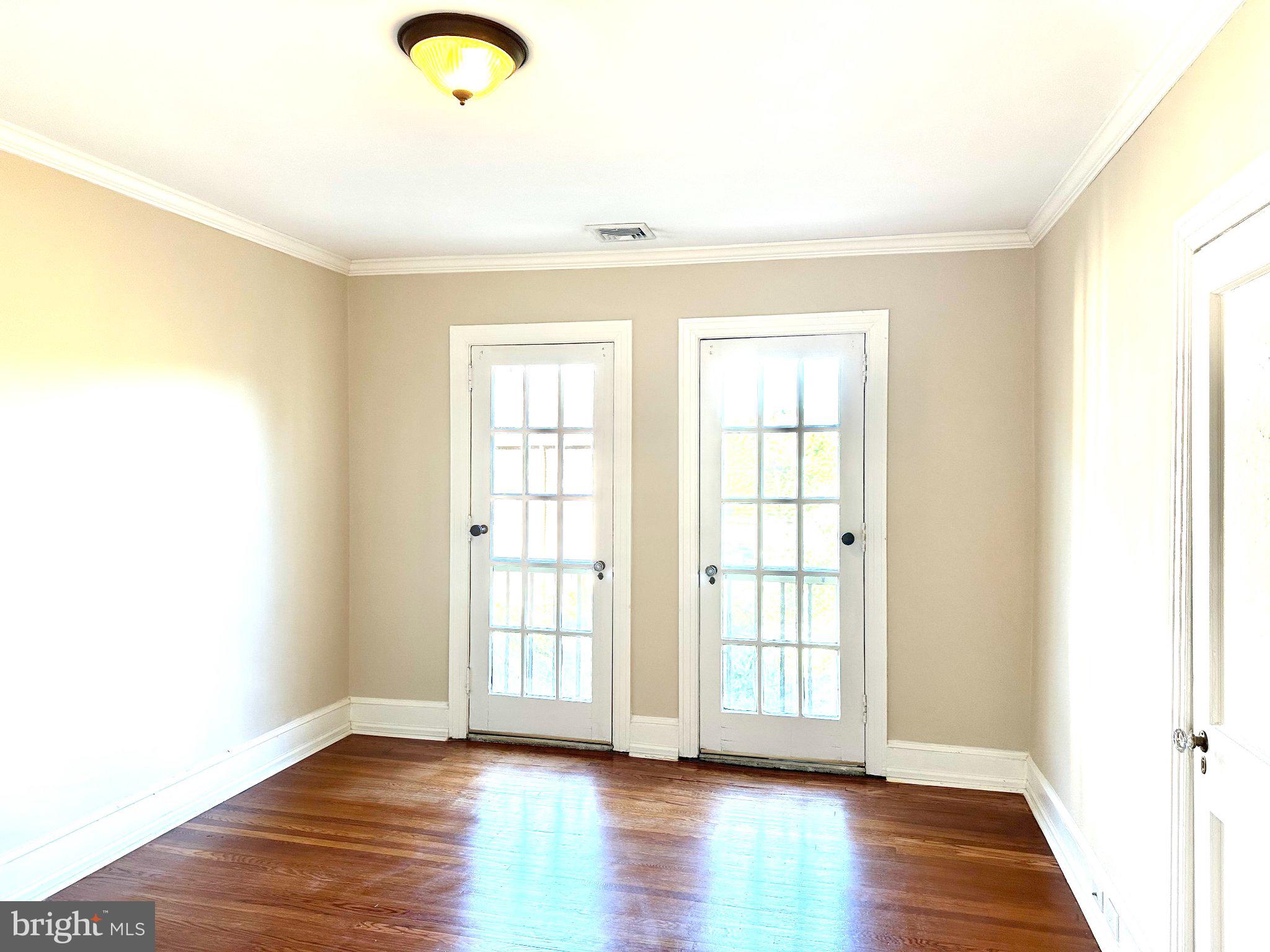 212 Idris Road, Unit F3 Merion Station, PA 19066 - Photo 30 of 38 Bedroom with French door to Juliet Balcony