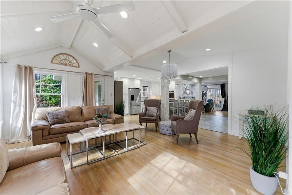302 Hascall Road Northwest Atlanta, GA 30309 - Photo 18 of 56 a living room with furniture and a large window
