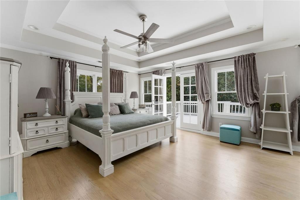 302 Hascall Road Northwest Atlanta, GA 30309 - Photo 23 of 56 a living room with furniture and large windows