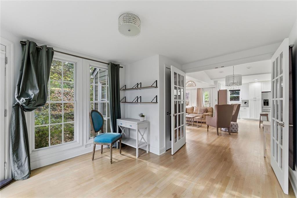 302 Hascall Road Northwest Atlanta, GA 30309 - Photo 36 of 56 a living room with furniture and a large window