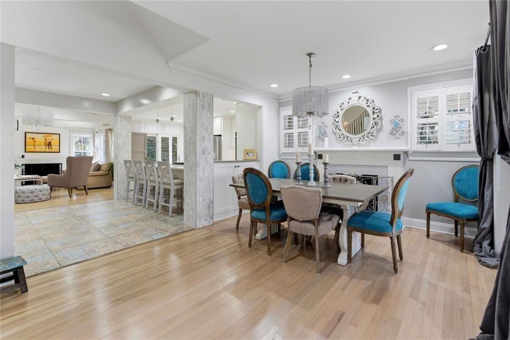 302 Hascall Road Northwest Atlanta, GA 30309 - Photo 8 of 56 a view of a dining room with furniture and wooden floor