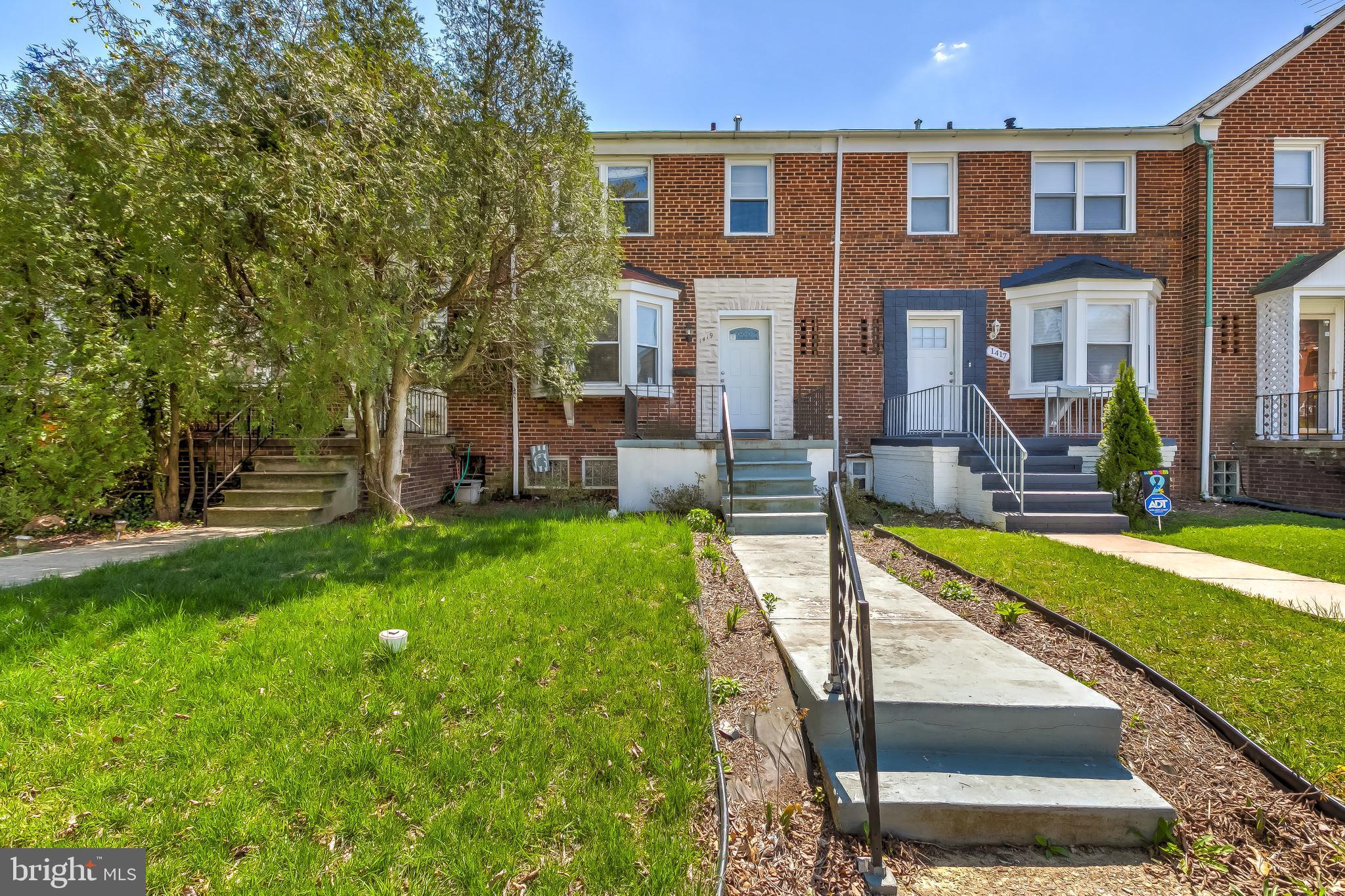 1419 Kingsway Road Baltimore, MD 21218 - Photo 2 of 38 a view of a house with a yard patio and a small yard