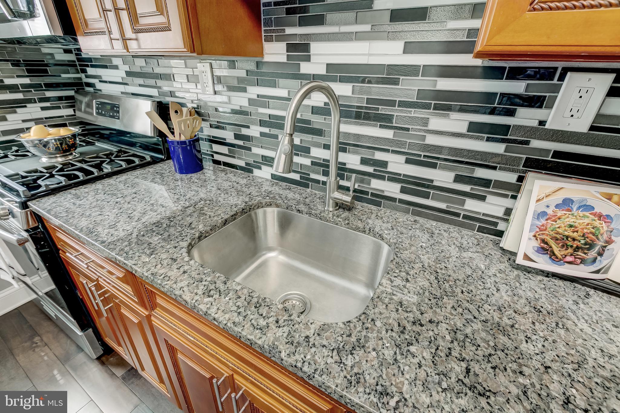 1419 Kingsway Road Baltimore, MD 21218 - Photo 15 of 38 a close view of sink and stove