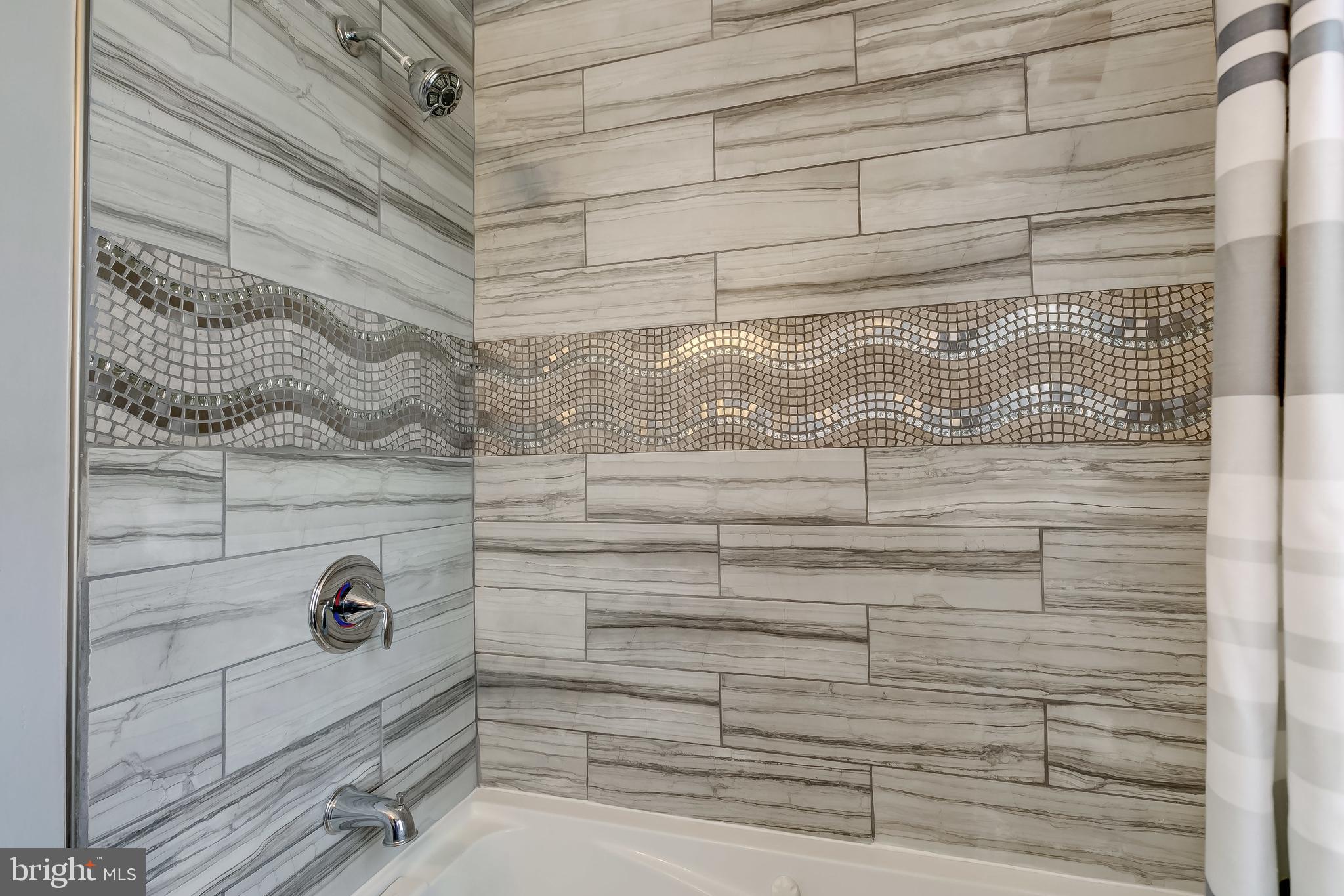 1419 Kingsway Road Baltimore, MD 21218 - Photo 23 of 38 a close up view of shower