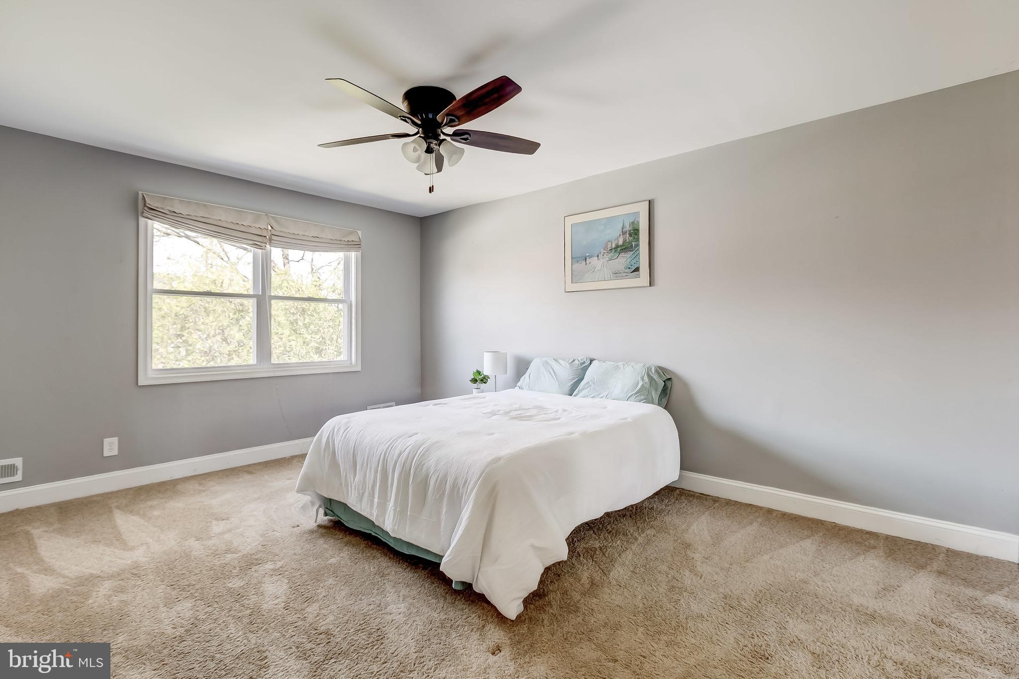 1419 Kingsway Road Baltimore, MD 21218 - Photo 25 of 38 a bed room with a bed and a window