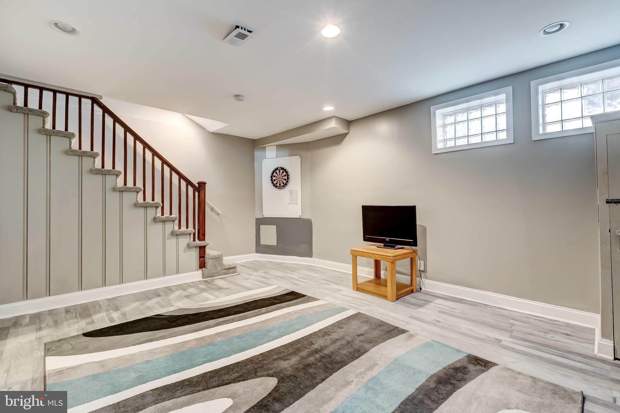 1419 Kingsway Road Baltimore, MD 21218 - Photo 28 of 38 a living room with balcony furniture and a window