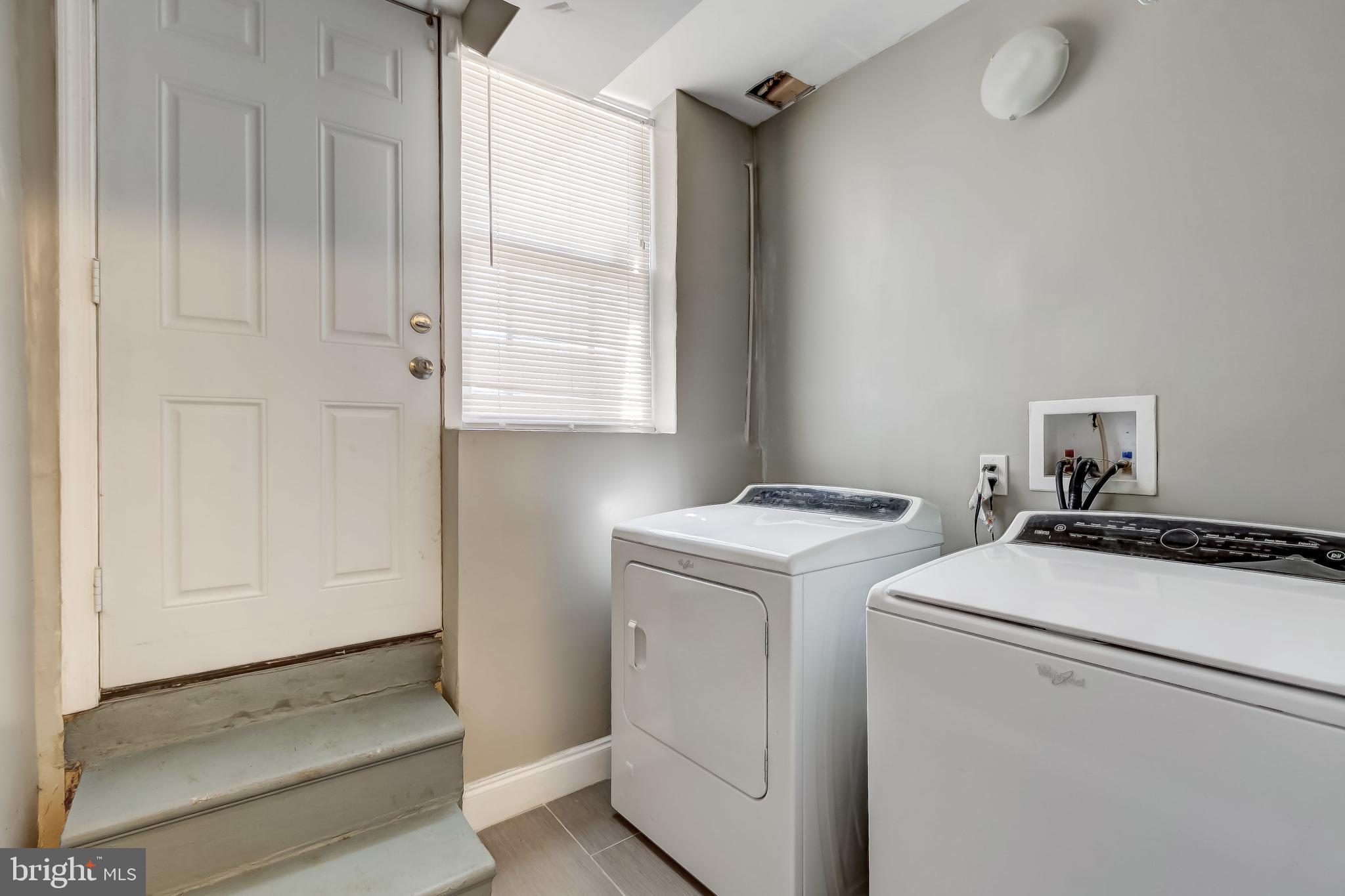 1419 Kingsway Road Baltimore, MD 21218 - Photo 33 of 38 a utility room with dryer and washer