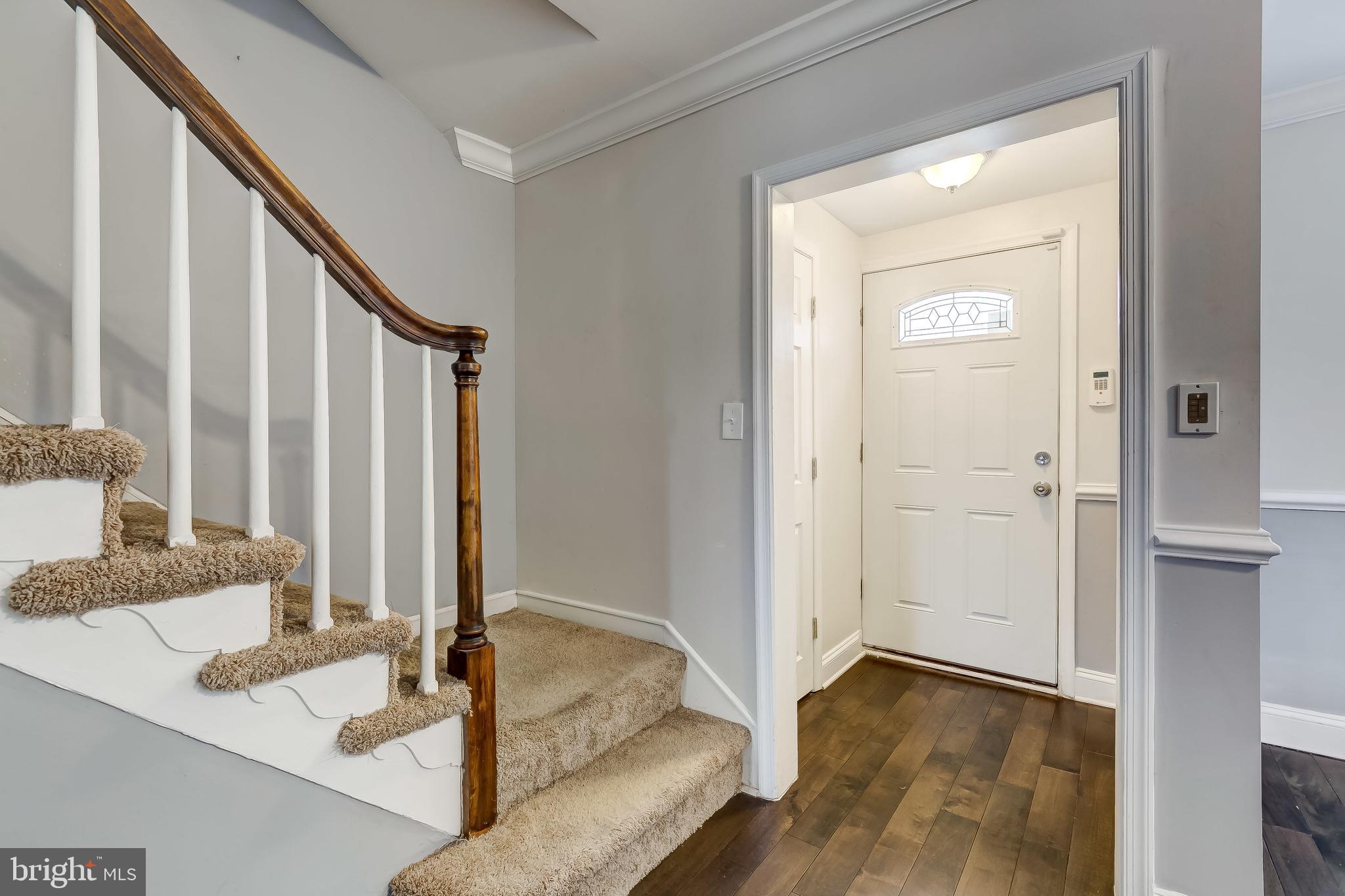 1419 Kingsway Road Baltimore, MD 21218 - Photo 5 of 38 a view of a bedroom with furniture and window