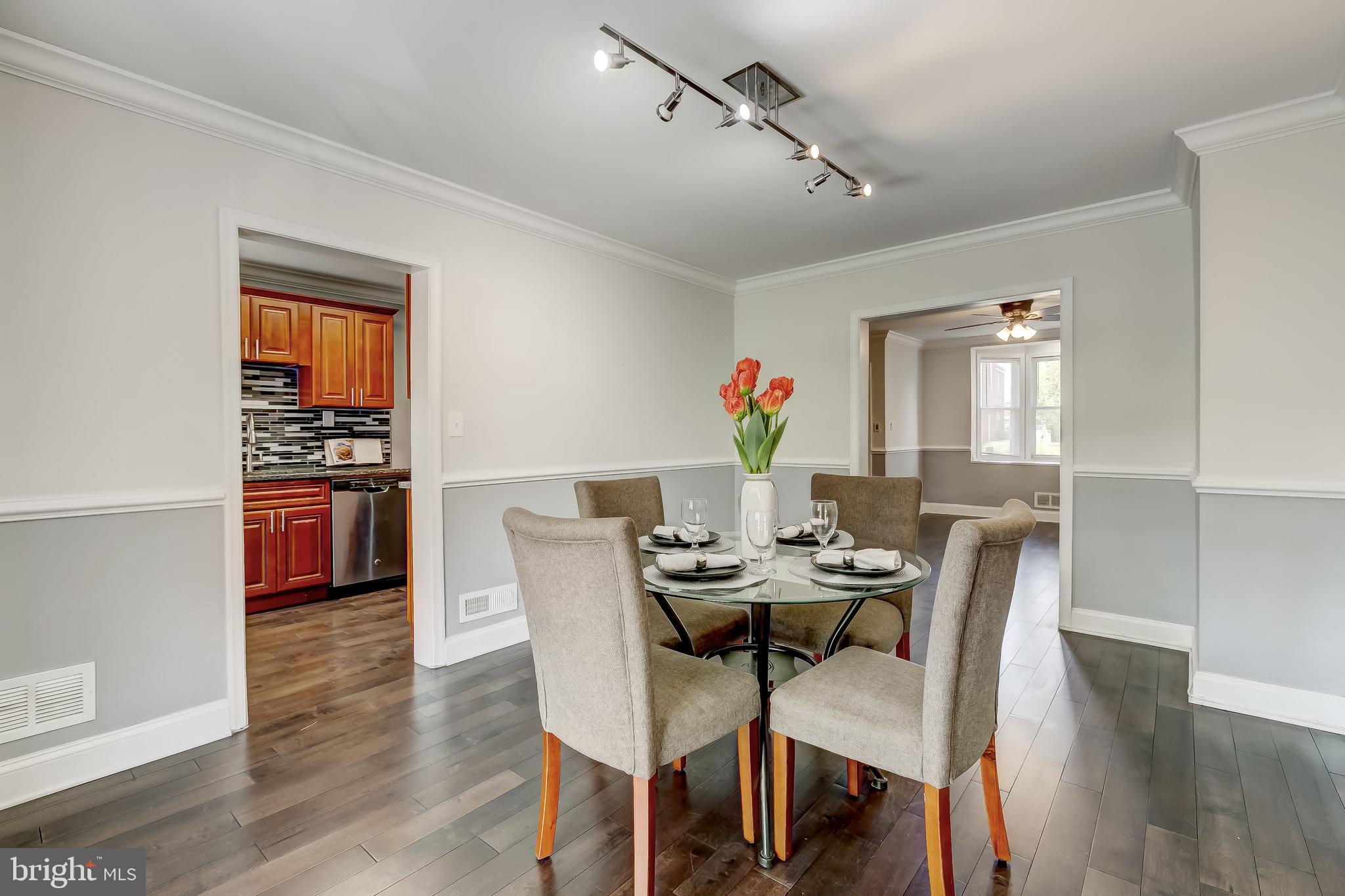 1419 Kingsway Road Baltimore, MD 21218 - Photo 10 of 38 a dining room with furniture and window