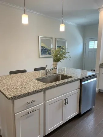 a bathroom with sink and mirror