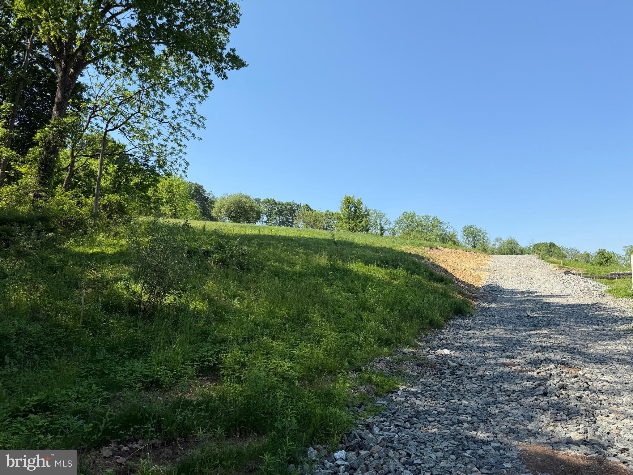 6596 Chestnut Hill Church Road Coopersburg, PA 18036 - Photo 2 of 7 a view of a lush green space with sea